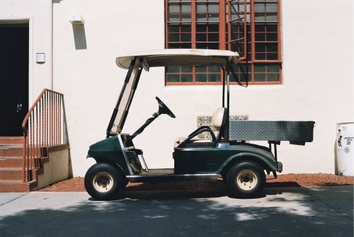 a truck is parked in front of a building